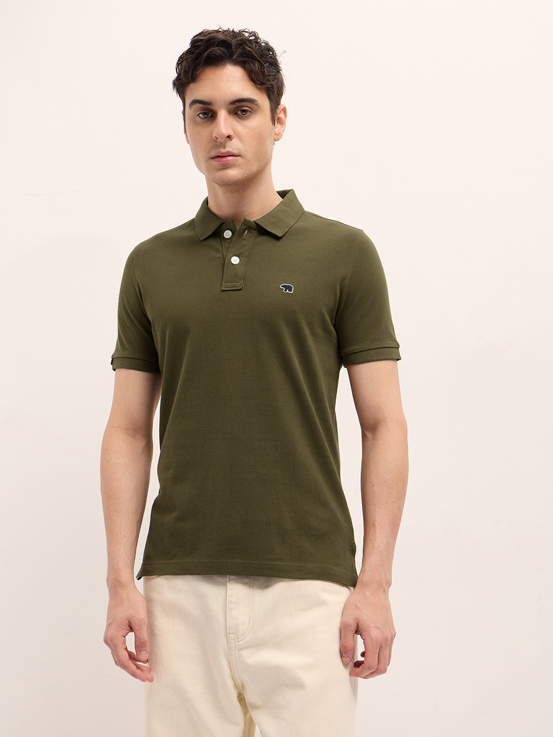 Dark Green Solid Regular Fit Polo with Embroidered Chest Logo
