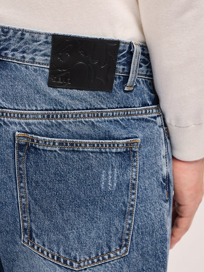 Light Blue with Light Fade Distressed Mid-Rise Relaxed Fit Jeans