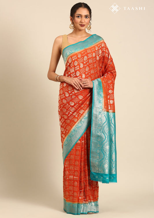 Burnt Orange Zari Woven Georgette Saree