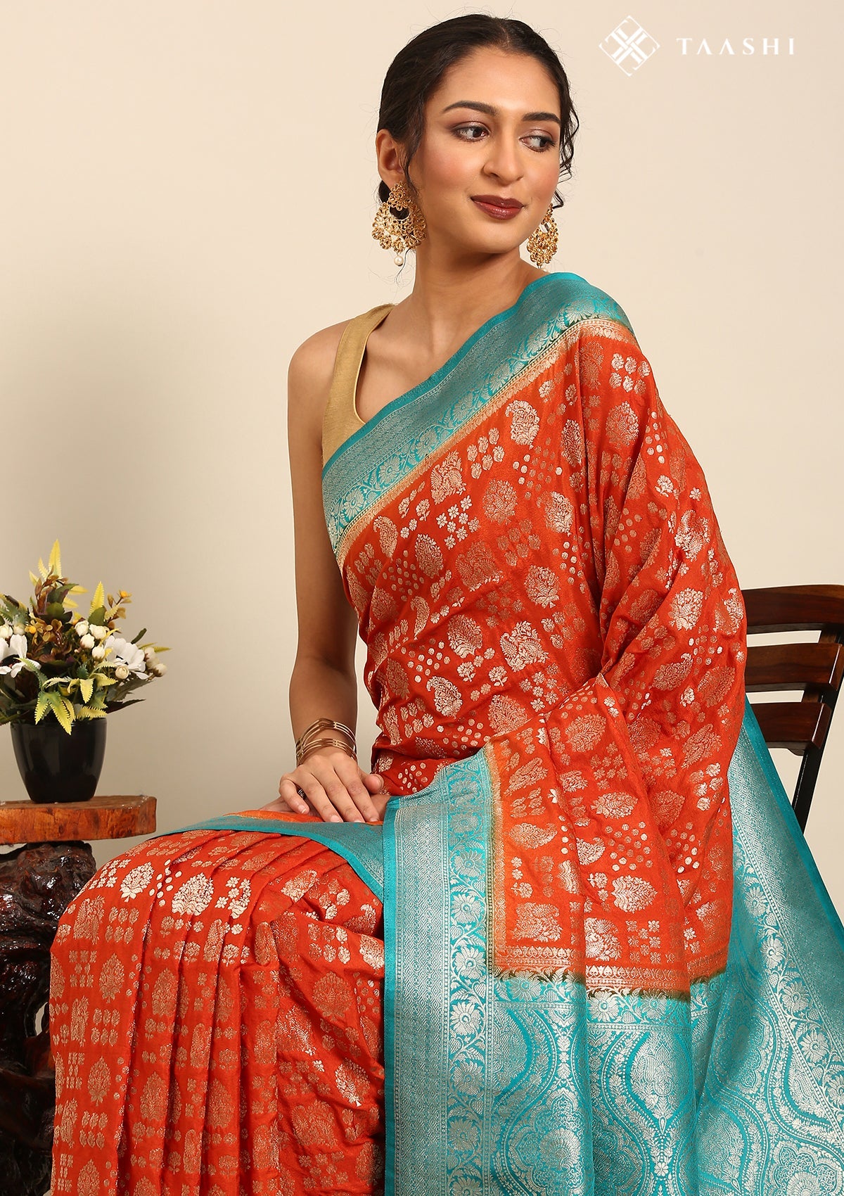 Burnt Orange Zari Woven Georgette Saree