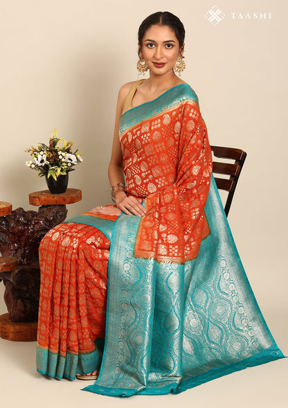 Burnt Orange Zari Woven Georgette Saree