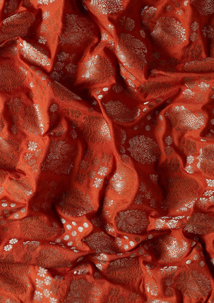 Burnt Orange Zari Woven Georgette Saree