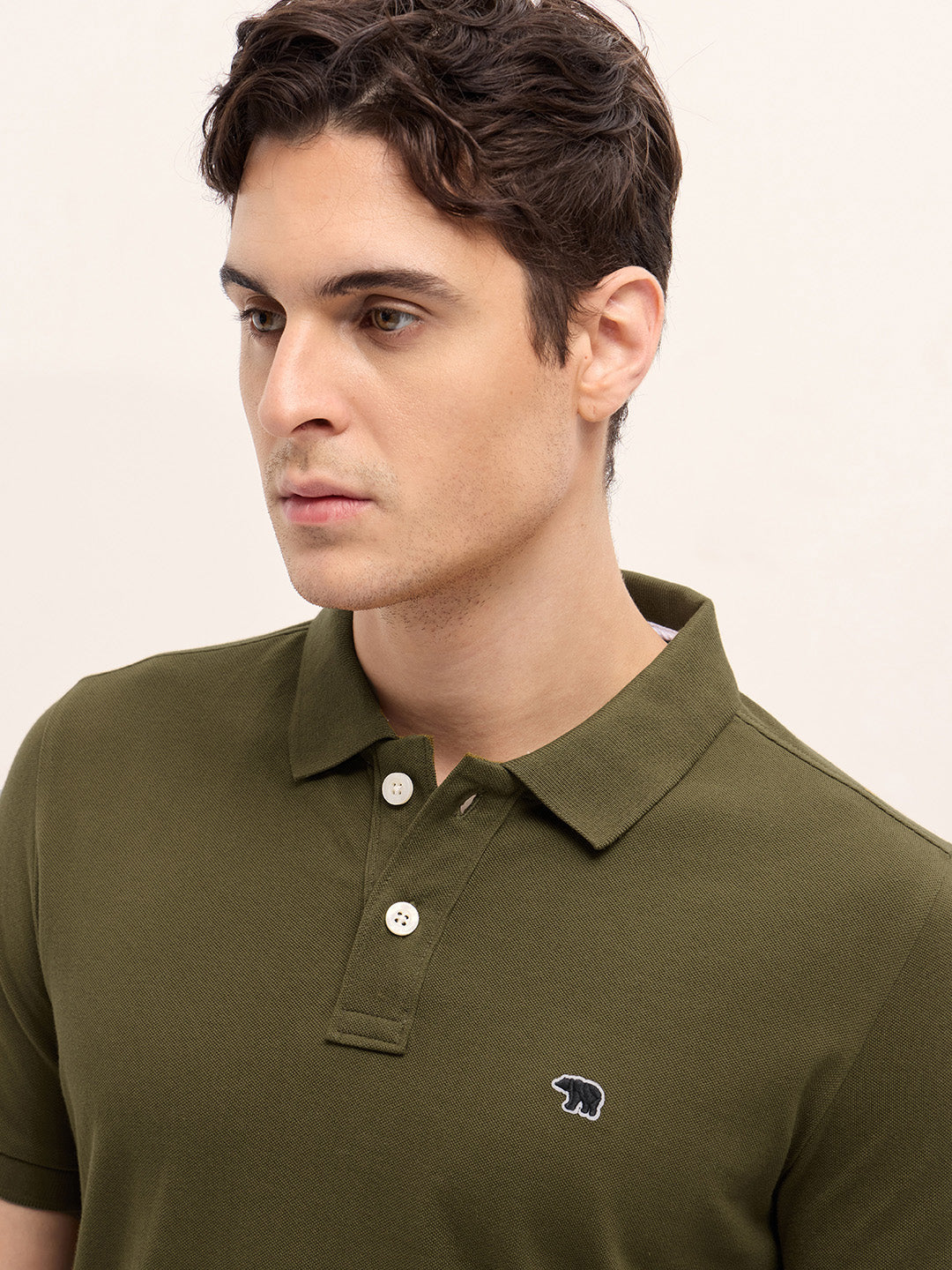 Dark Green Solid Regular Fit Polo with Embroidered Chest Logo