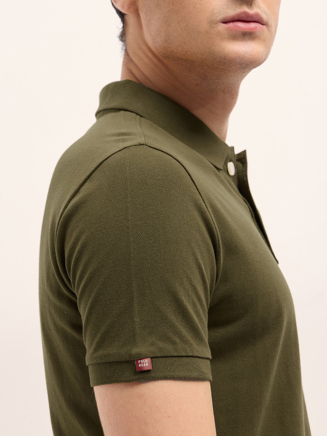 Dark Green Solid Regular Fit Polo with Embroidered Chest Logo