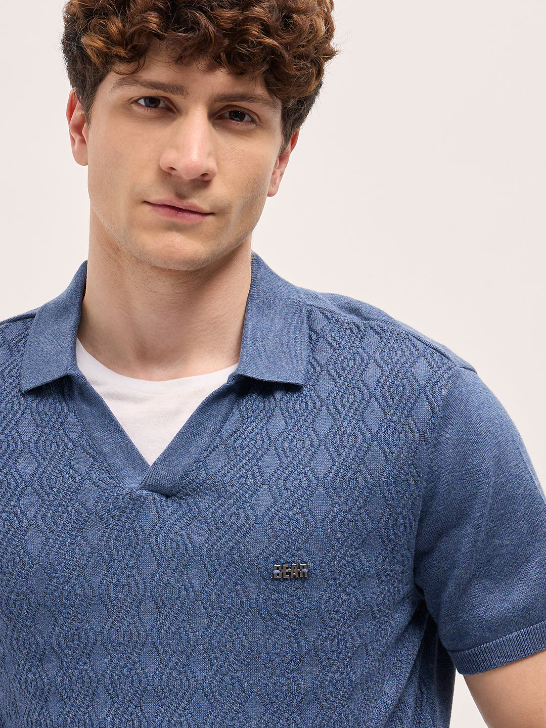 Blue Geometric textured Knit Slim Fit Polo