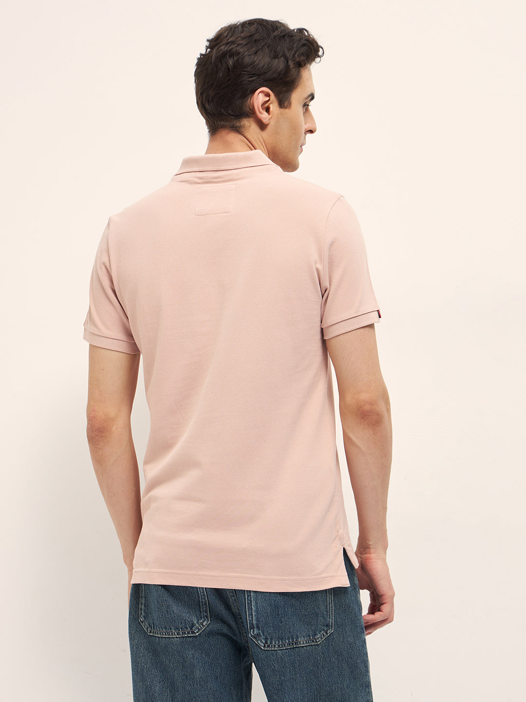 Peach Solid Regular Fit Polo with Embroidered Chest Logo