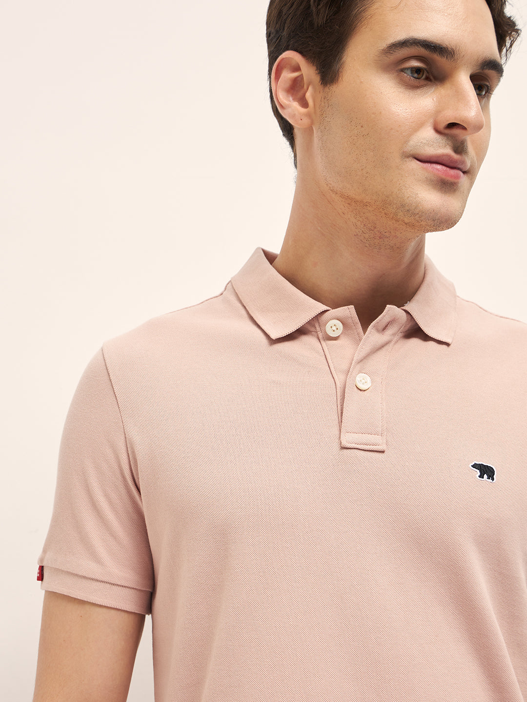 Peach Solid Regular Fit Polo with Embroidered Chest Logo