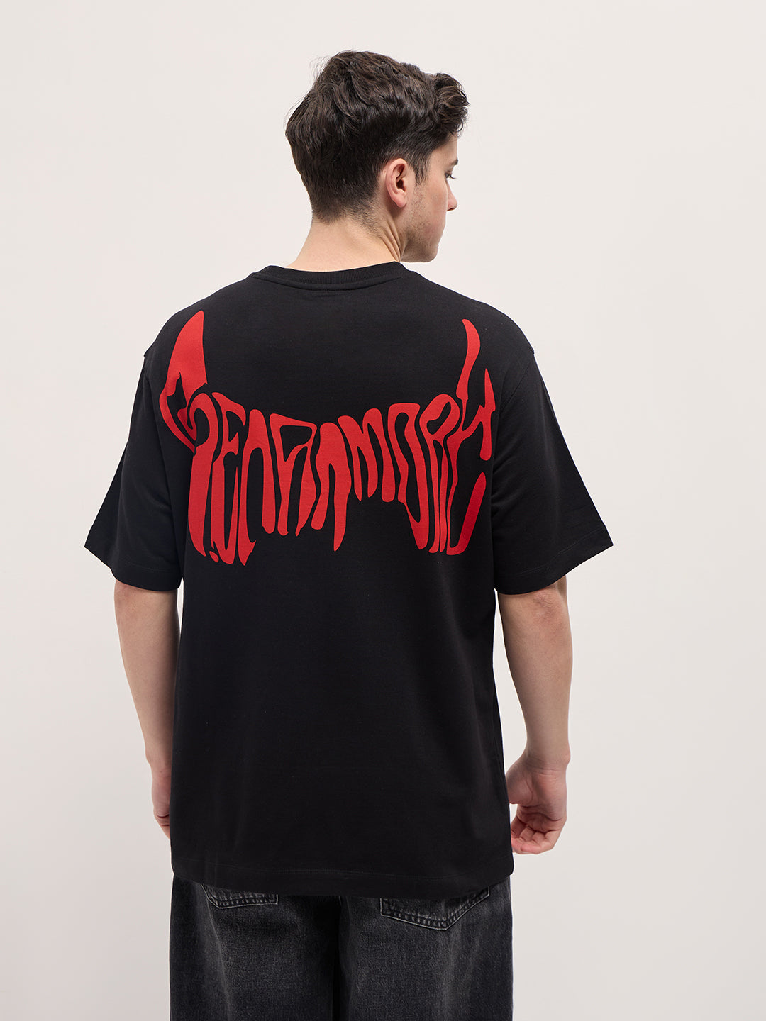 Black Graphic T-Shirt with Bold Red Abstract Design