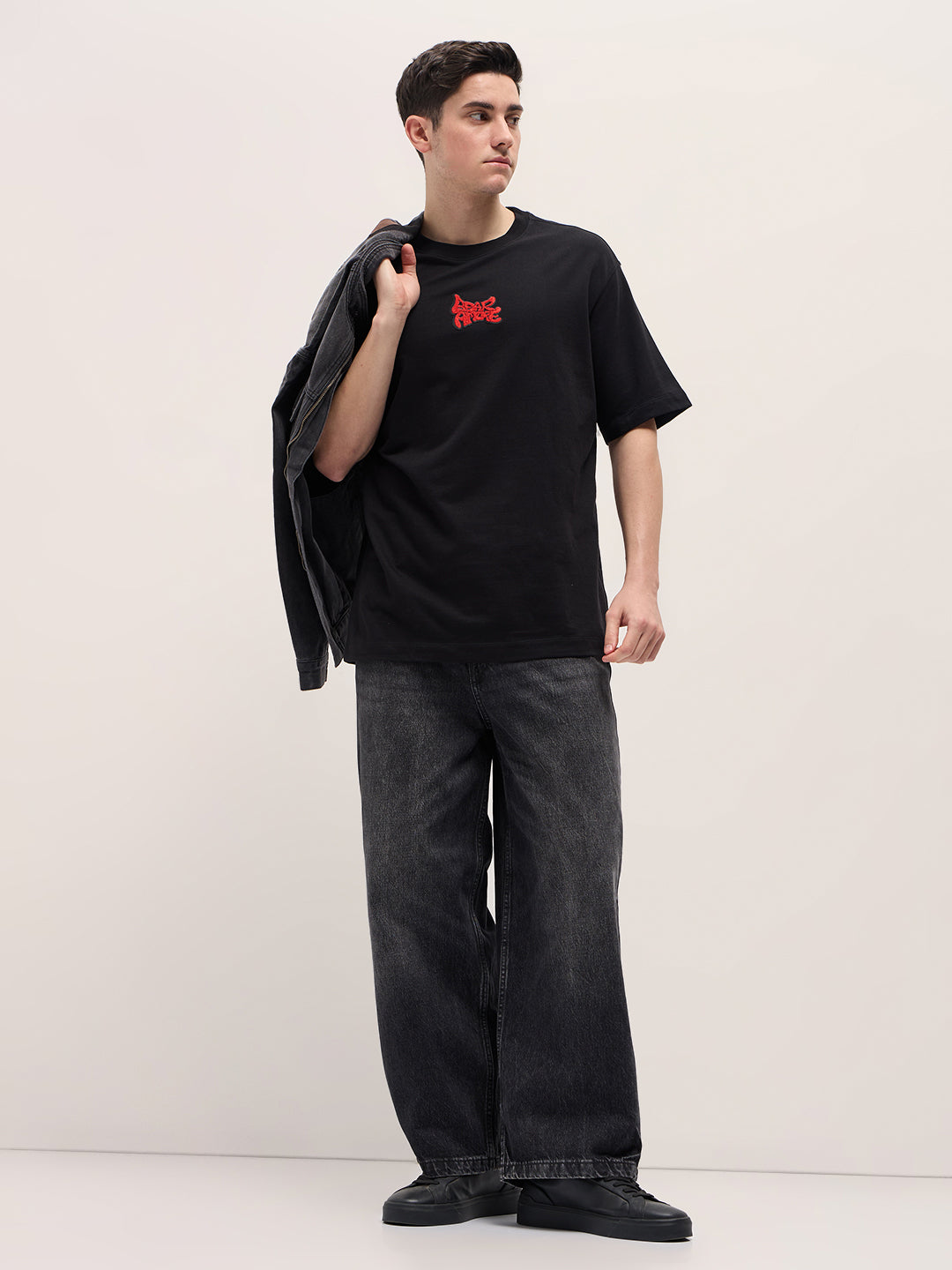 Black Graphic T-Shirt with Bold Red Abstract Design